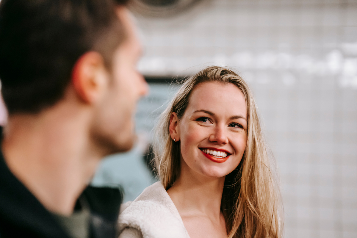 Happy woman with anonymous man